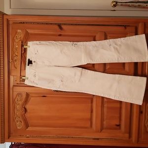 White jeans with embroidered flowers embellished with pearls & clear stones